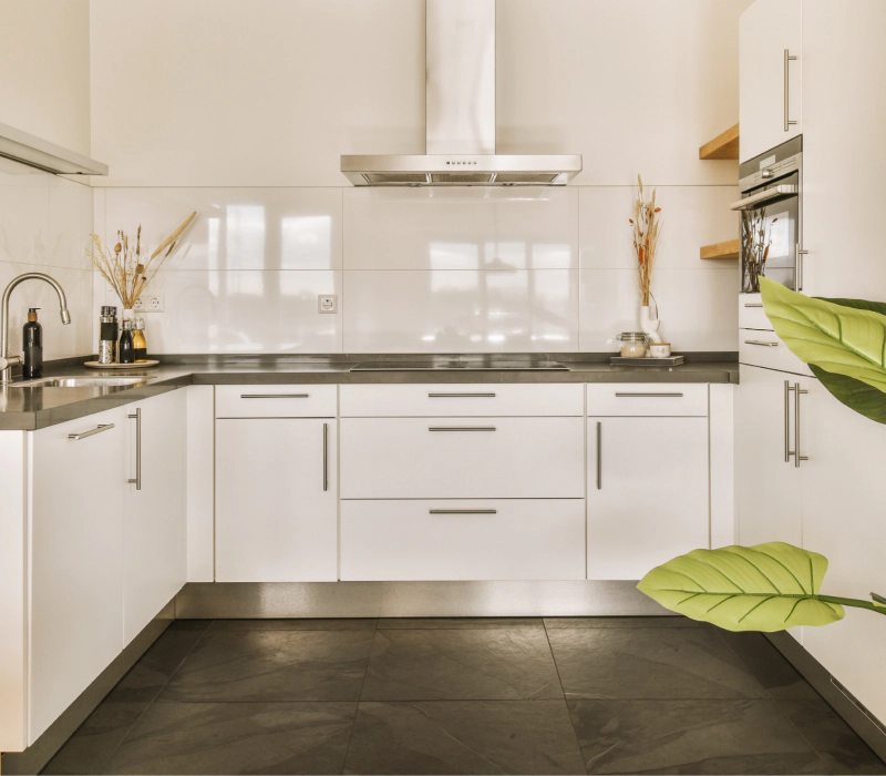 small kitchen with white cabinets